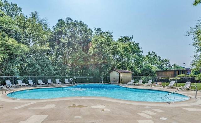 1 Renaissance Pl Unit 805, Palatine, IL 60067 - community pool featuring a patio area and view of wooded area