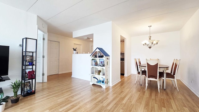 1 Renaissance Pl Unit 805, Palatine, IL 60067 - dining room featuring light wood-type flooring, a chandelier, and baseboards