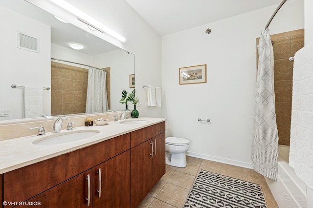 757 N Orleans St Unit 711, Chicago, IL 60654 - bathroom with double vanity, tile patterned floors, shower / tub combo, toilet, and baseboards