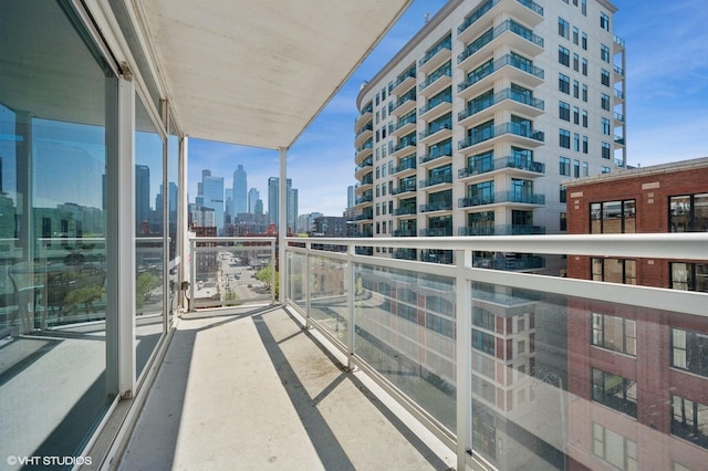 757 N Orleans St Unit 711, Chicago, IL 60654 - balcony featuring a skyline view