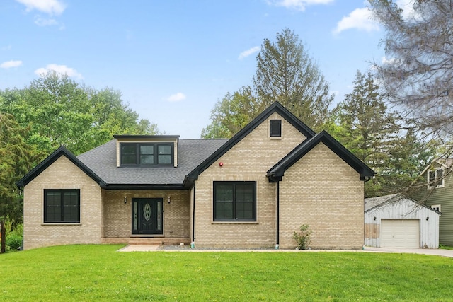 3026 Jackson Dr, Arlington Heights, IL 60004 - view of front facade featuring an outdoor structure, brick siding, a front lawn, a garage, and roof with shingles