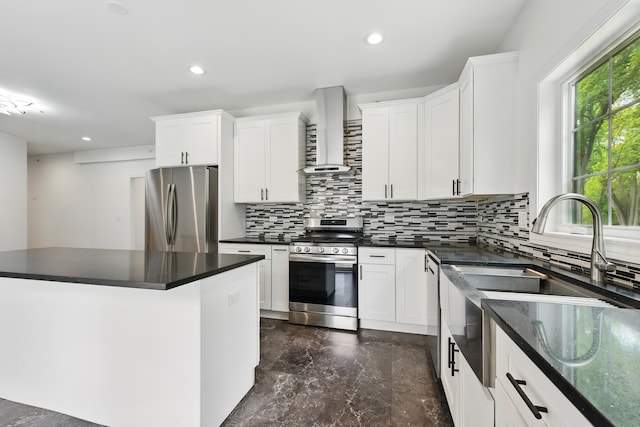 3026 Jackson Dr, Arlington Heights, IL 60004 - kitchen featuring appliances with stainless steel finishes, wall chimney range hood, backsplash, dark marble finish flooring, and dark countertops