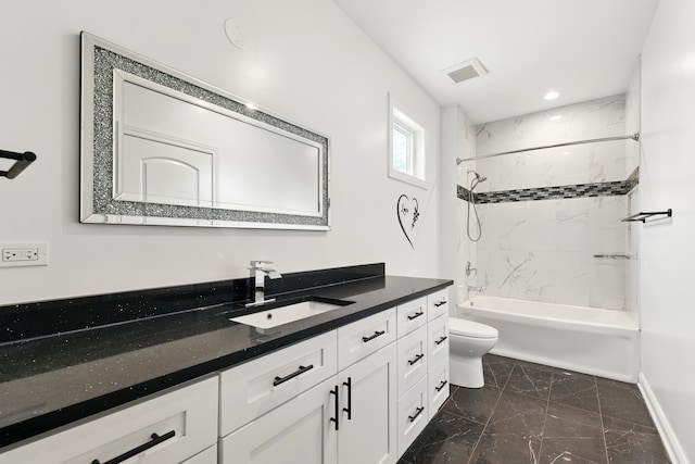 3026 Jackson Dr, Arlington Heights, IL 60004 - bathroom with marble look tile flooring, toilet, vanity, tub / shower combination, and baseboards