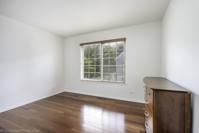 150 Lucerne Ct Unit 150, Wheeling, IL 60090 - empty room featuring dark wood-style floors and baseboards