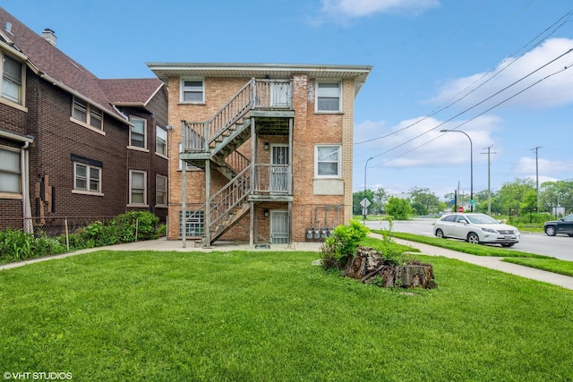 32 E 137th St, Riverdale, IL 60827 - view of property featuring stairway
