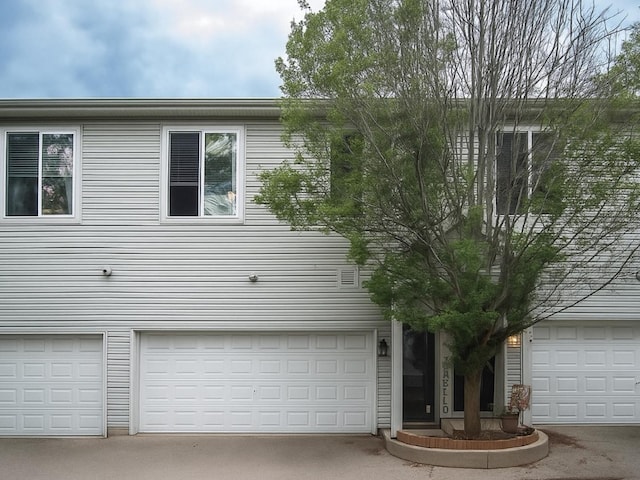 1716 Simms St Unit 0, Aurora, IL 60504 - view of front facade featuring a garage