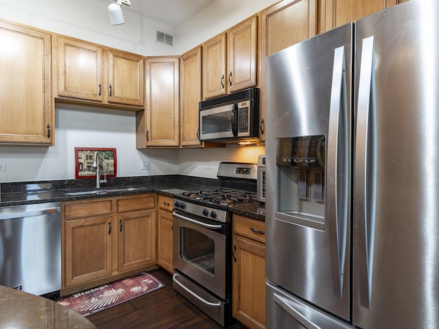1716 Simms St Unit 0, Aurora, IL 60504 - kitchen with appliances with stainless steel finishes, dark wood-style floors, and dark stone counters