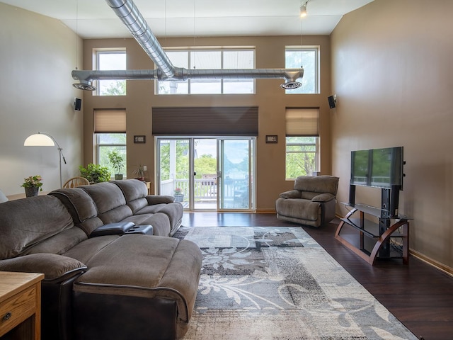 1716 Simms St Unit 0, Aurora, IL 60504 - living area featuring dark wood-type flooring and a towering ceiling