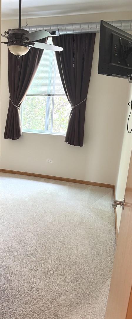 1716 Simms St Unit 0, Aurora, IL 60504 - spare room featuring carpet flooring, ceiling fan, and baseboards