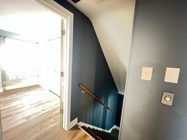 1474 Forest Ave, Calumet City, IL 60409 - staircase featuring wood finished floors, lofted ceiling, and baseboards