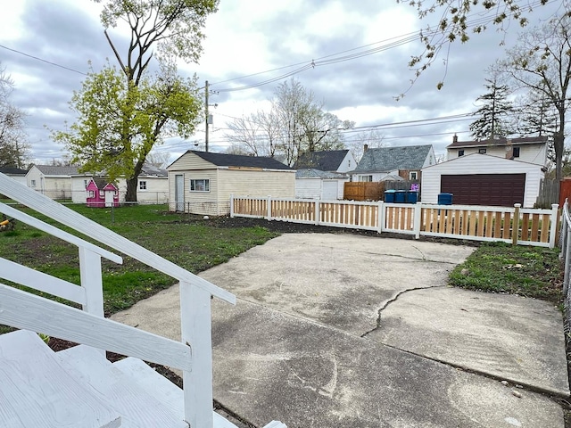 1474 Forest Ave, Calumet City, IL 60409 - view of yard with an outbuilding, a garage, and a residential view