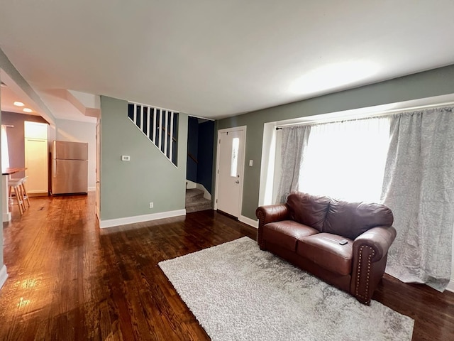 1474 Forest Ave, Calumet City, IL 60409 - living room with stairs, wood finished floors, and baseboards