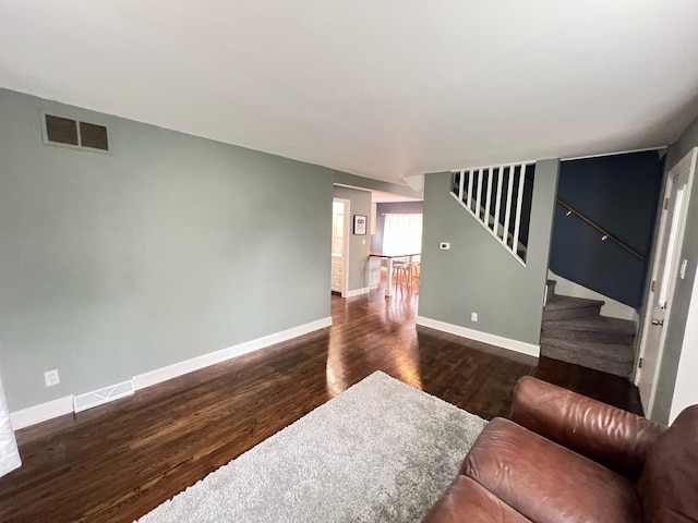 1474 Forest Ave, Calumet City, IL 60409 - living area with wood finished floors, baseboards, and stairs