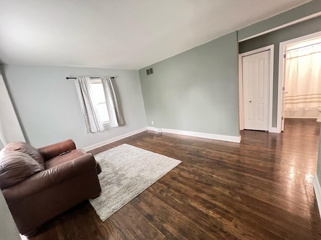 1474 Forest Ave, Calumet City, IL 60409 - living room featuring dark wood finished floors and baseboards