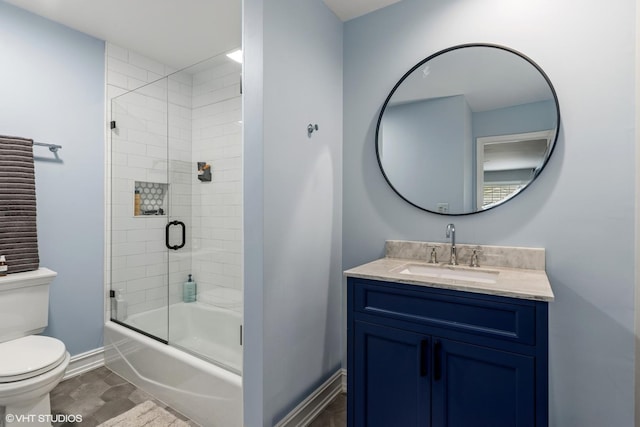 506 Westgate Rd, Deerfield, IL 60015 - bathroom with toilet, vanity, combined bath / shower with glass door, and baseboards