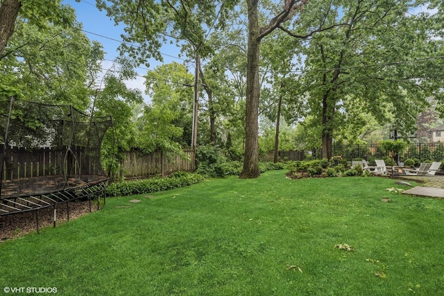 506 Westgate Rd, Deerfield, IL 60015 - view of yard featuring a trampoline