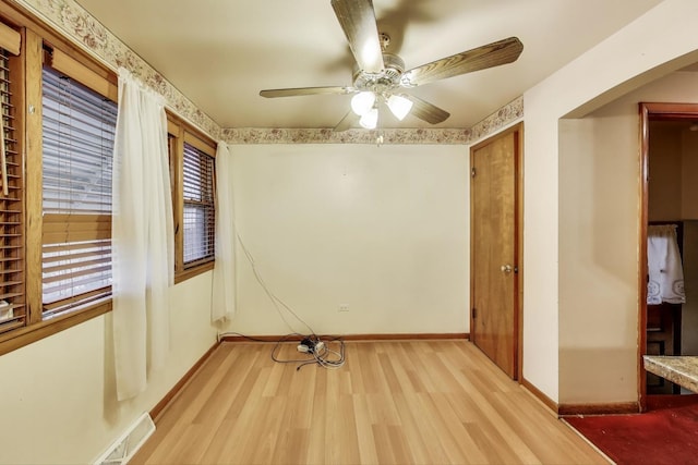 6636 S Rockwell St, Chicago, IL 60629 - unfurnished room with light wood-type flooring, ceiling fan, and baseboards