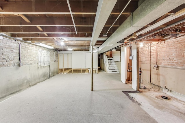 6636 S Rockwell St, Chicago, IL 60629 - below grade area with stairway and brick wall