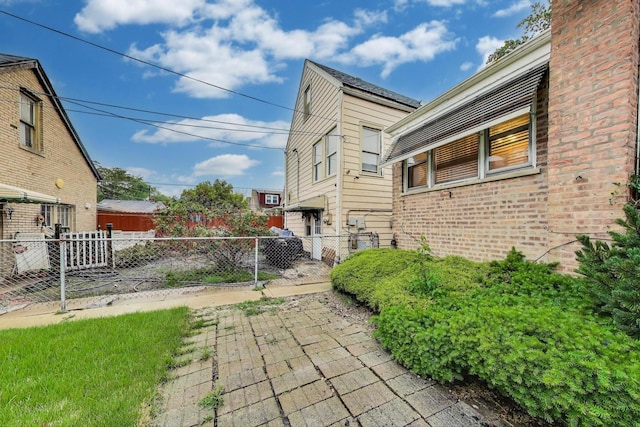 6636 S Rockwell St, Chicago, IL 60629 - view of side of home with brick siding