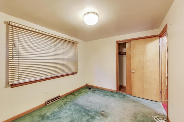 6636 S Rockwell St, Chicago, IL 60629 - unfurnished bedroom with carpet floors, baseboards, and a closet