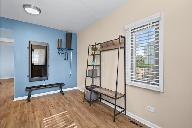 3050 Charles St, Melrose Park, IL 60164 - exercise area with wood finished floors and baseboards