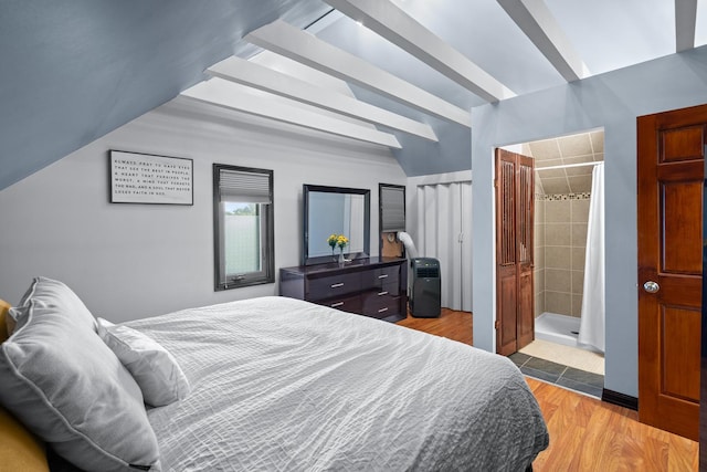 3050 Charles St, Melrose Park, IL 60164 - bedroom featuring light wood finished floors and ensuite bathroom