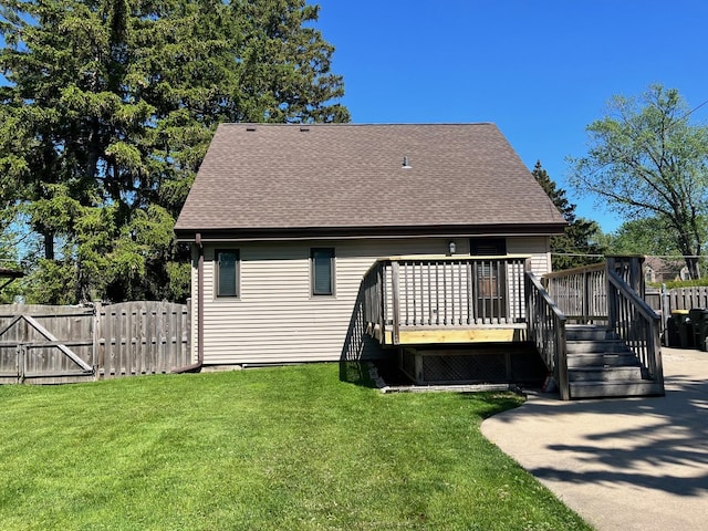 3050 Charles St, Melrose Park, IL 60164 - rear view of house with a deck, roof with shingles, and a gate