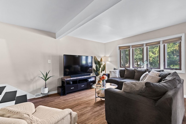 3050 Charles St, Melrose Park, IL 60164 - living area featuring light wood-style floors and beamed ceiling