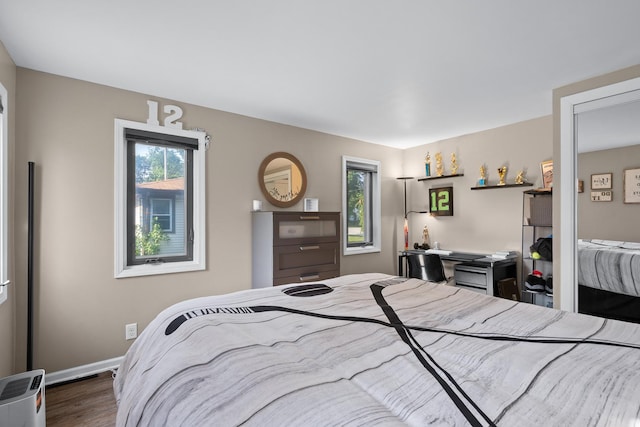 3050 Charles St, Melrose Park, IL 60164 - bedroom featuring wood finished floors and baseboards