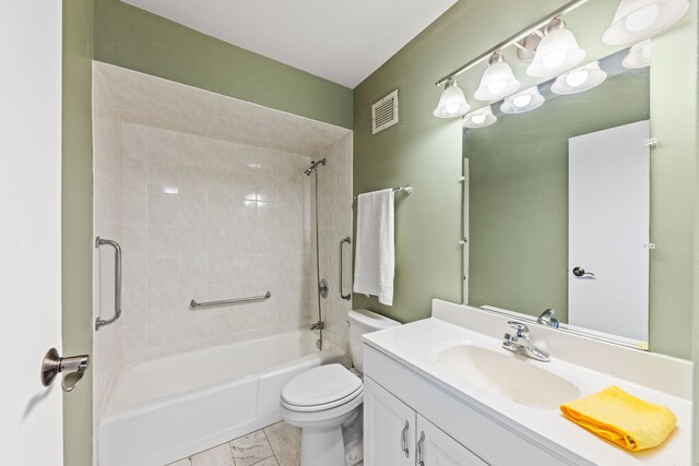 40 N Tower Rd Unit 14B, Oak Brook, IL 60523 - bathroom featuring vanity, shower / bathtub combination, and toilet