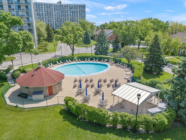 40 N Tower Rd Unit 14B, Oak Brook, IL 60523 - view of swimming pool with a yard