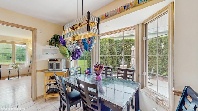 20195 Augusta Dr, Olympia Fields, IL 60461 - dining space with baseboards and light tile patterned flooring