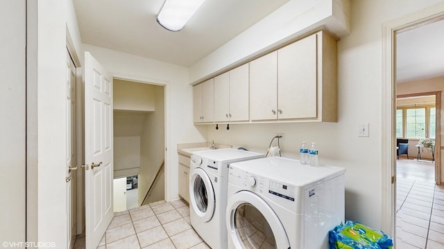 20195 Augusta Dr, Olympia Fields, IL 60461 - laundry room with washer and clothes dryer, light tile patterned flooring, and cabinet space