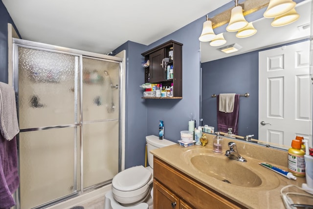 17212 Oak Park Ave Unit 2Sw, Tinley Park, IL 60477 - bathroom with vanity, toilet, and a stall shower
