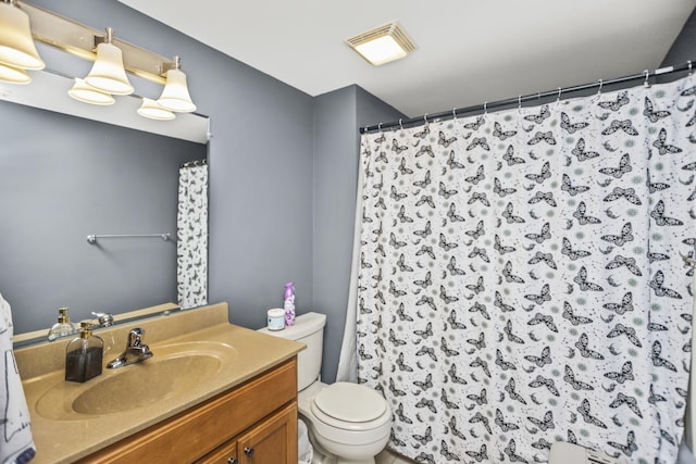 17212 Oak Park Ave Unit 2Sw, Tinley Park, IL 60477 - bathroom featuring toilet, vanity, and curtained shower