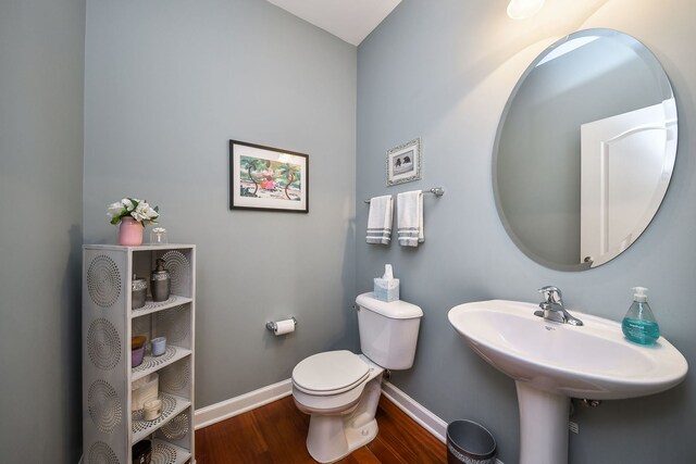426 Victoria Ln Unit 426, Elgin, IL 60124 - half bath featuring baseboards, wood finished floors, and toilet