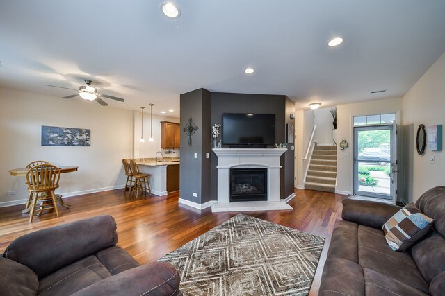 426 Victoria Ln Unit 426, Elgin, IL 60124 - living room featuring stairway, wood finished floors, ceiling fan, baseboards, and recessed lighting