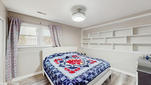 2080 Maplewood Cir, Naperville, IL 60563 - bedroom with wood finished floors and baseboards