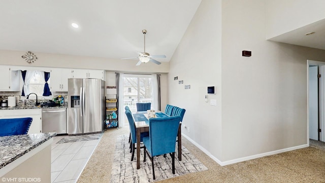 2080 Maplewood Cir, Naperville, IL 60563 - dining room featuring ceiling fan, lofted ceiling, light colored carpet, and baseboards