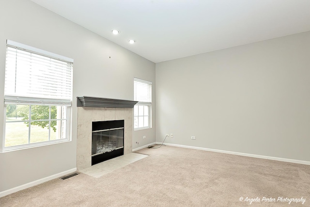 2704 Kendall Xing Unit 2704, Johnsburg, IL 60051 - unfurnished living room with carpet flooring, baseboards, a tile fireplace, and recessed lighting
