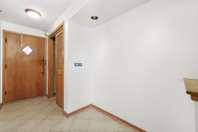 6534 N NW Hwy Unit 3D, Chicago, IL 60631 - corridor with baseboards and light tile patterned floors