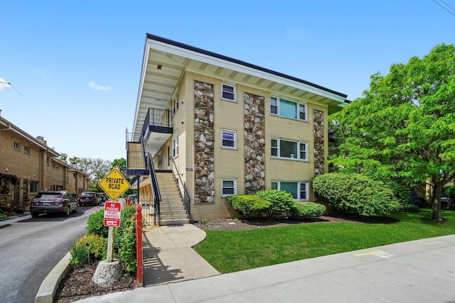 6534 N NW Hwy Unit 3D, Chicago, IL 60631 - view of building exterior featuring stairs