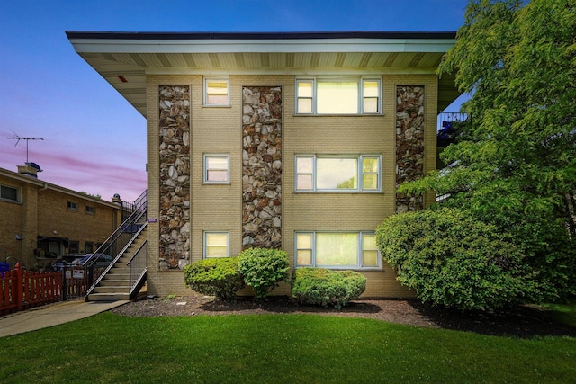 6534 N NW Hwy Unit 3D, Chicago, IL 60631 - property at dusk featuring stairway