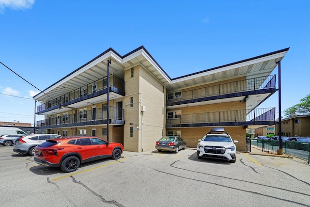 6534 N NW Hwy Unit 3D, Chicago, IL 60631 - view of building exterior with uncovered parking