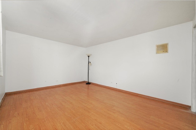 6534 N NW Hwy Unit 3D, Chicago, IL 60631 - spare room with light wood-type flooring and baseboards