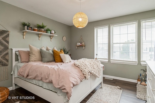 1987 Rosehill Ct, Romeoville, IL 60446 - bedroom with baseboards and dark wood-style flooring