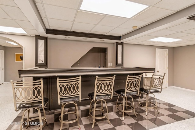 1987 Rosehill Ct, Romeoville, IL 60446 - indoor dry bar with a drop ceiling, baseboards, and arched walkways