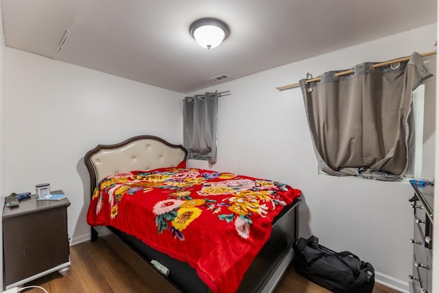 3340 W Polk St, Chicago, IL 60624 - bedroom with wood finished floors and baseboards
