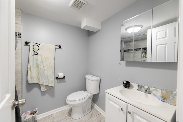 3340 W Polk St, Chicago, IL 60624 - bathroom featuring vanity, toilet, baseboards, and a shower