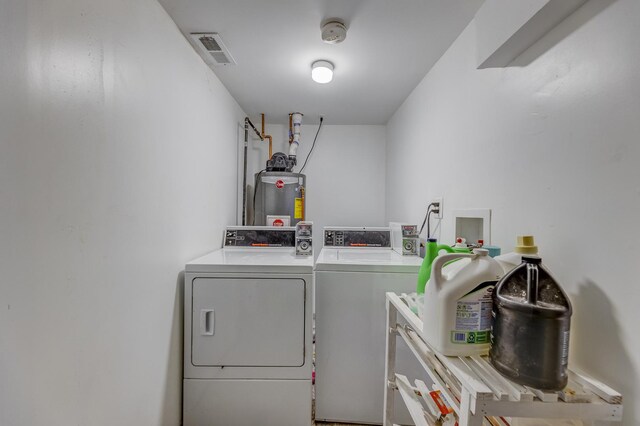 3340 W Polk St, Chicago, IL 60624 - laundry room with independent washer and dryer and water heater